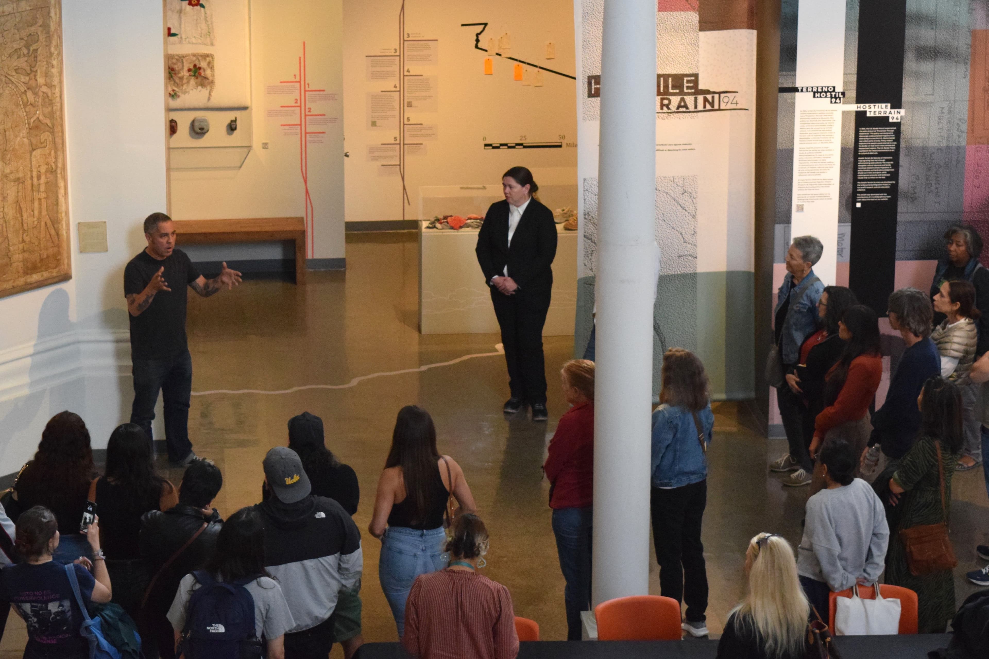 A photo of Jason De Leon kicking off the group discussion in the exhibit.